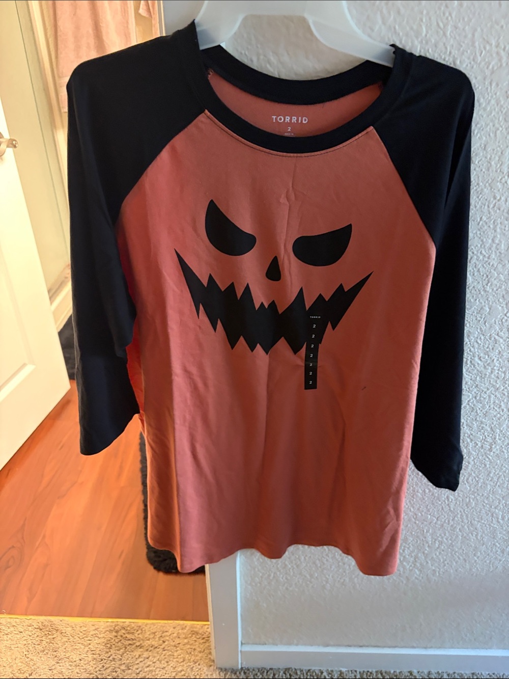 Torrid Orange and Black Pumpkin Face Raglan Top
